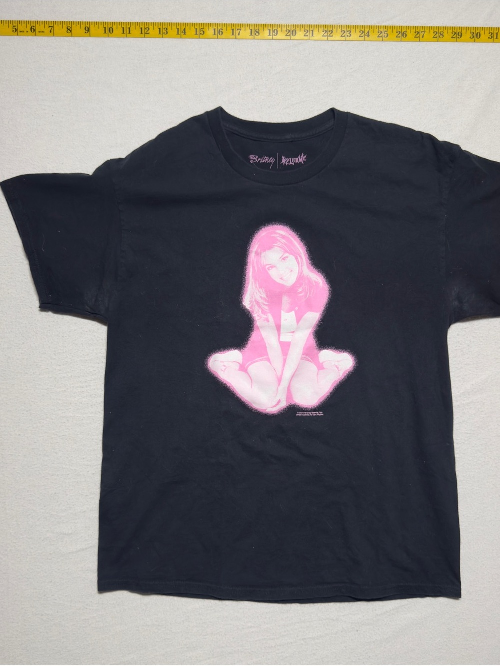 Britney spears X welcome skateboard T-shirt label inside neckline